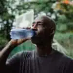 man drinking water