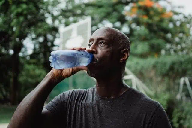 man drinking water